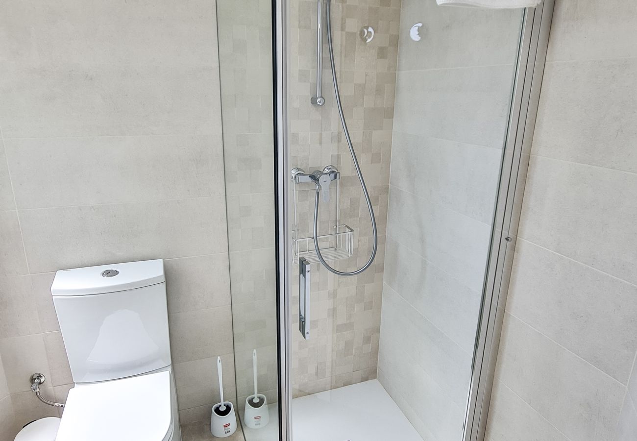 Separate bathroom with shower.