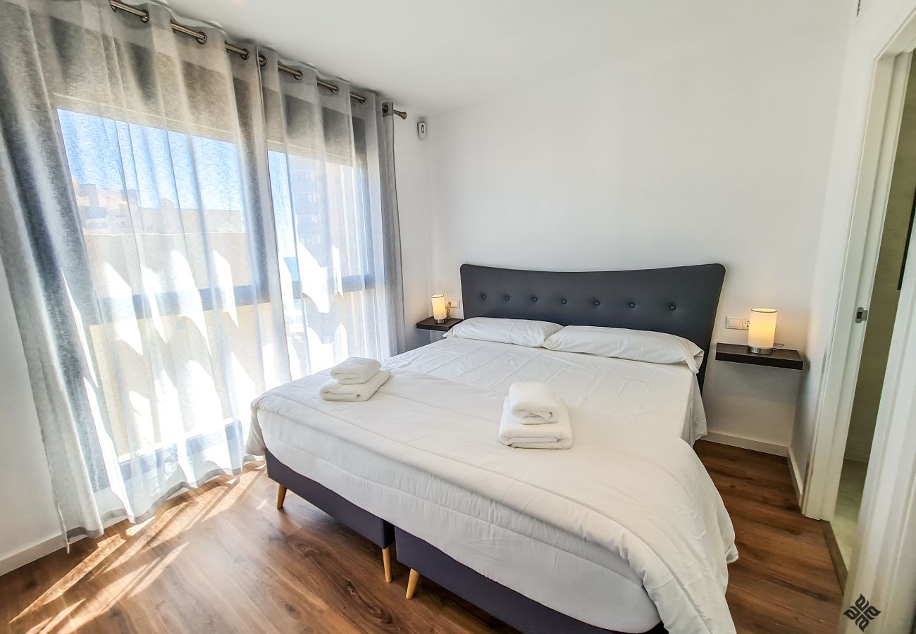 Bedroom with double bed with incredible sea views.
